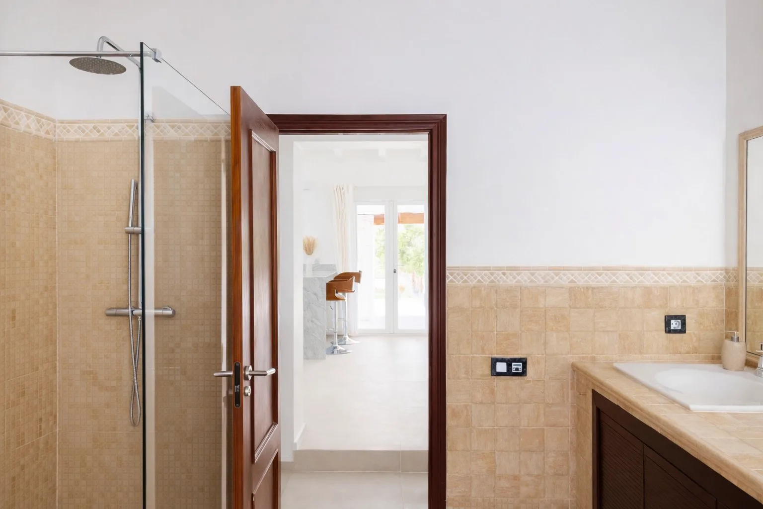 Casa Lux bathroom with walk-in shower and calm spa-style details